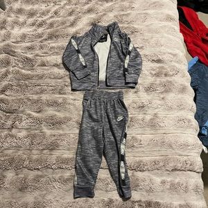Nike 12 months track suit. Grey and black.
